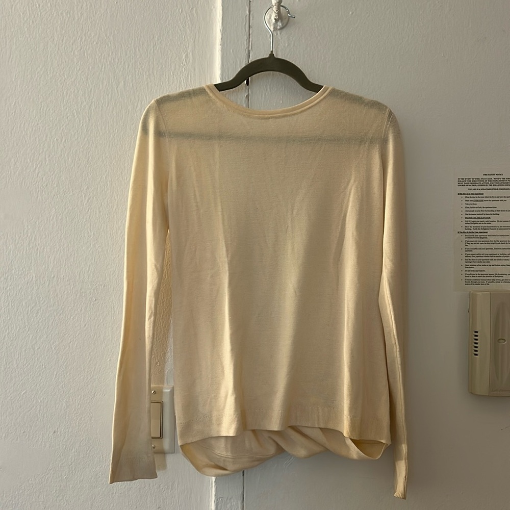 Cream knit long sleeve sweater with open back